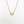 Load image into Gallery viewer, Gold necklace with a rectangular pink gemstone on a white background
