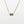 Load image into Gallery viewer, Gold necklace with a rectangular gemstone pendant on a white background
