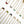 Load image into Gallery viewer, Gold necklaces with colorful gemstones on a white background
